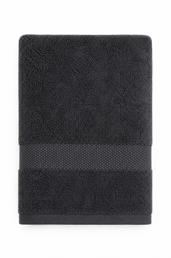 Opgevouwen antraciet katoenen handdoek uit de saunaset